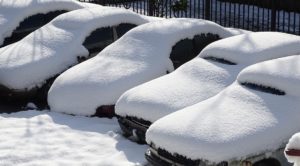 snow covered cars